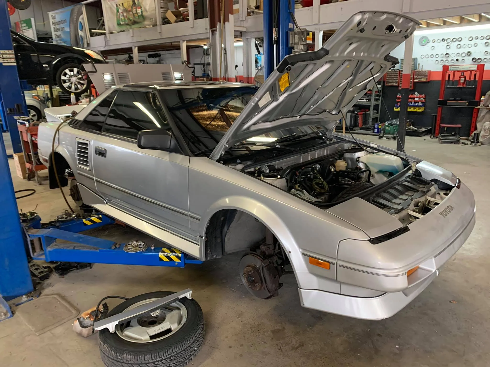 Mechanic working on car